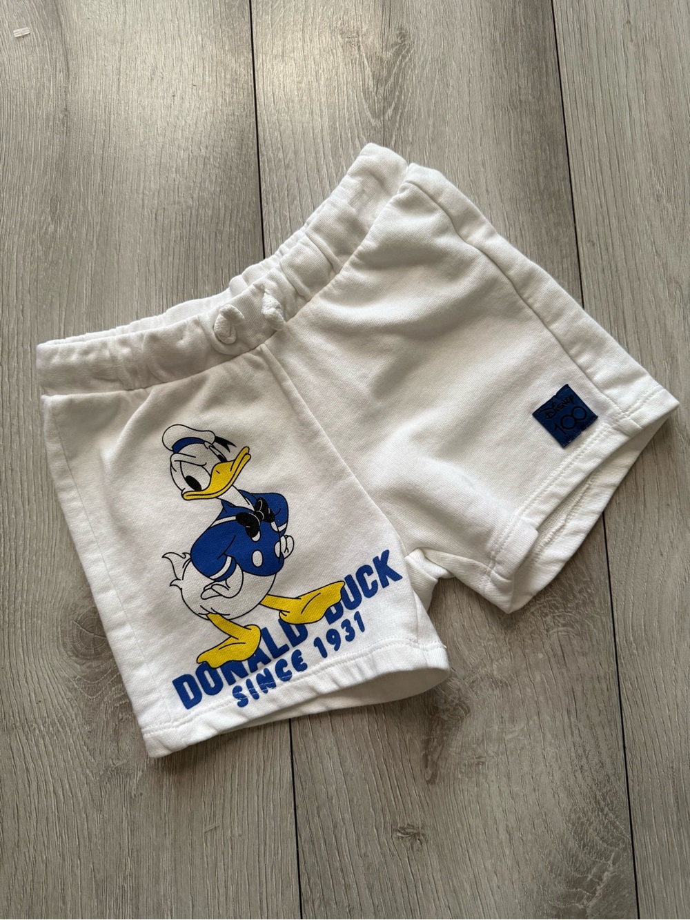 Zara White Kids Shorts with Donald Duck Graphic and Blue Accents
